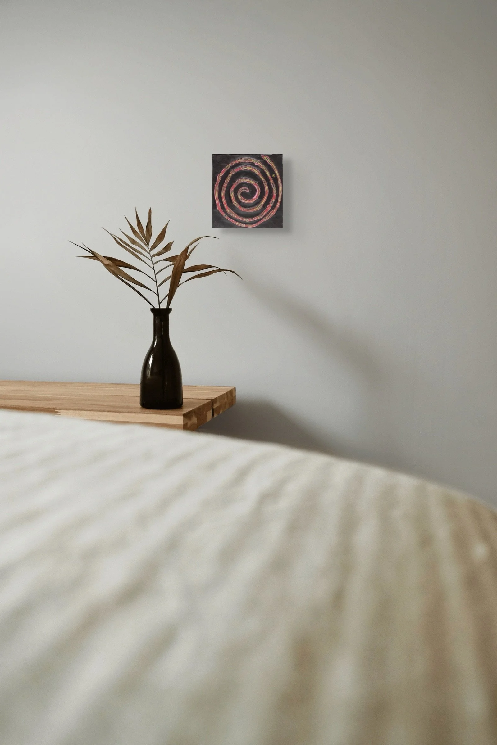 Black #5, sculptural carved paper artwork by Michele Bonds, installed in modern interior