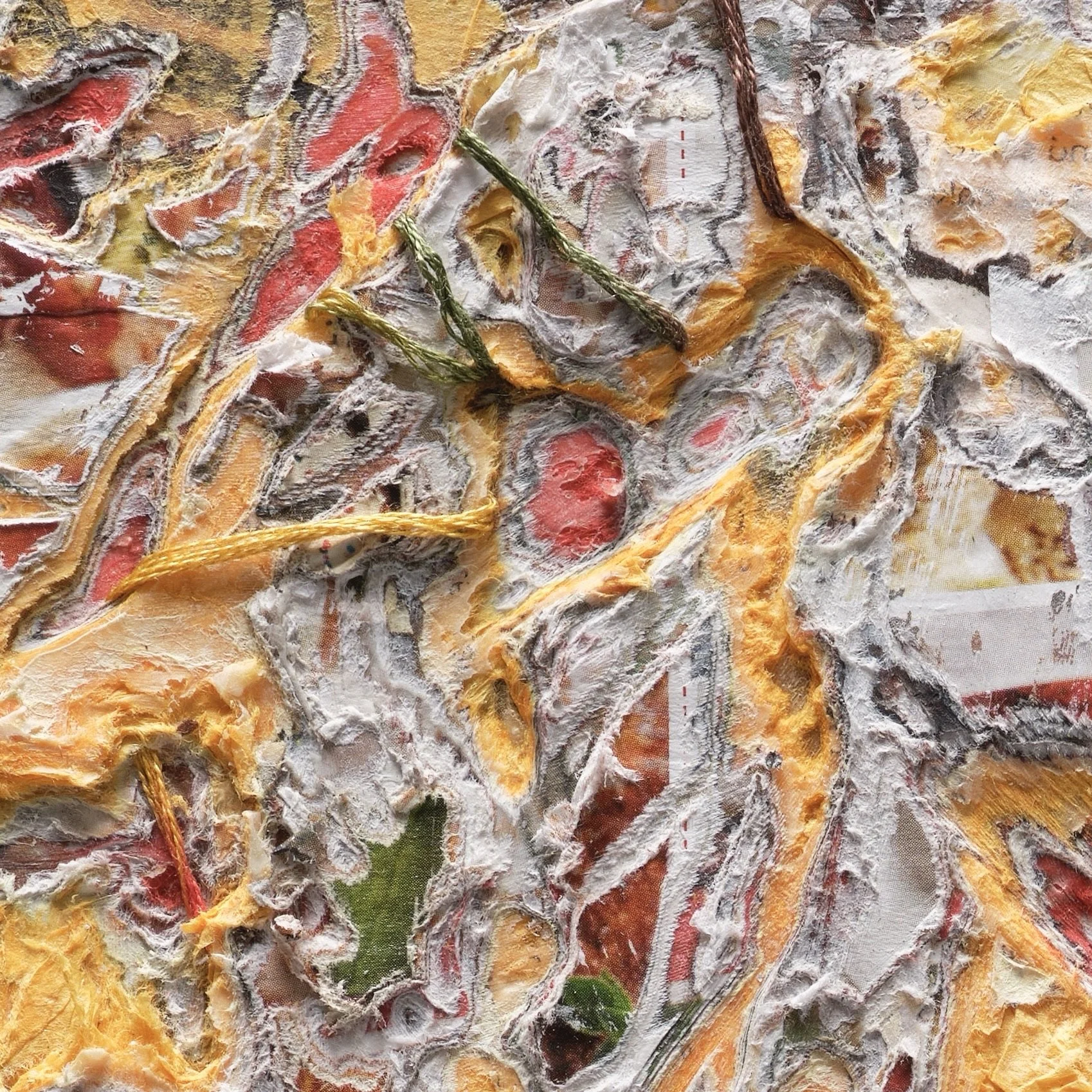Macro detail of Phoenix Burning highlighting carved paper relief and internal structure