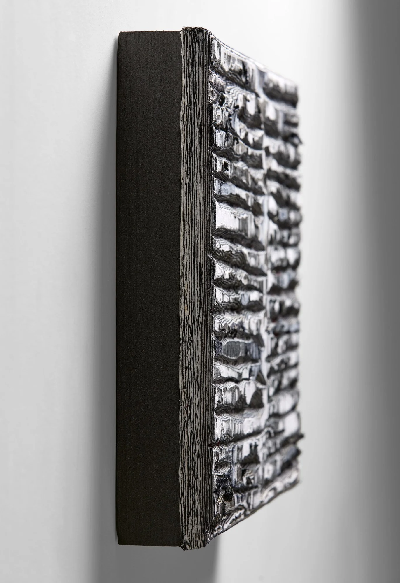 Detail of Axial Memory showing layered and hand-carved paper surface