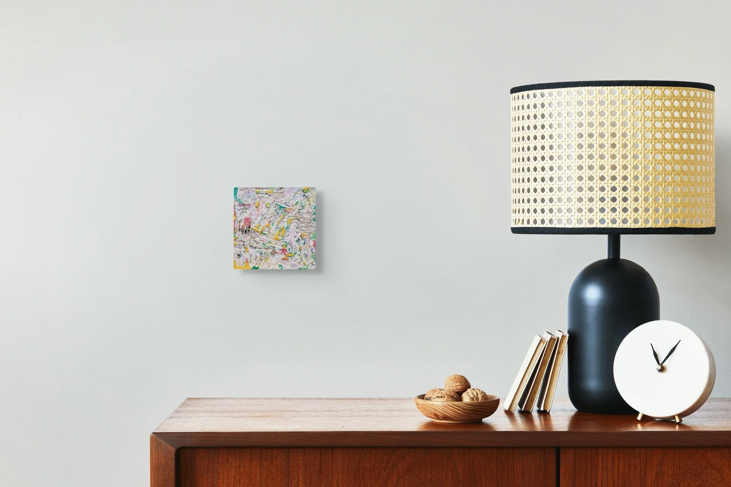 Fire #3, sculptural paper artwork by Michele Bonds, displayed in neutral interior setting