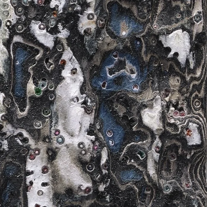 Macro detail of White #4 highlighting carved paper relief and internal structure