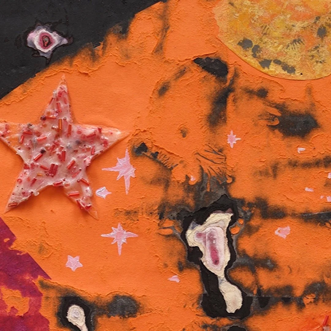 Macro detail of Scorpius highlighting carved paper relief and internal structure