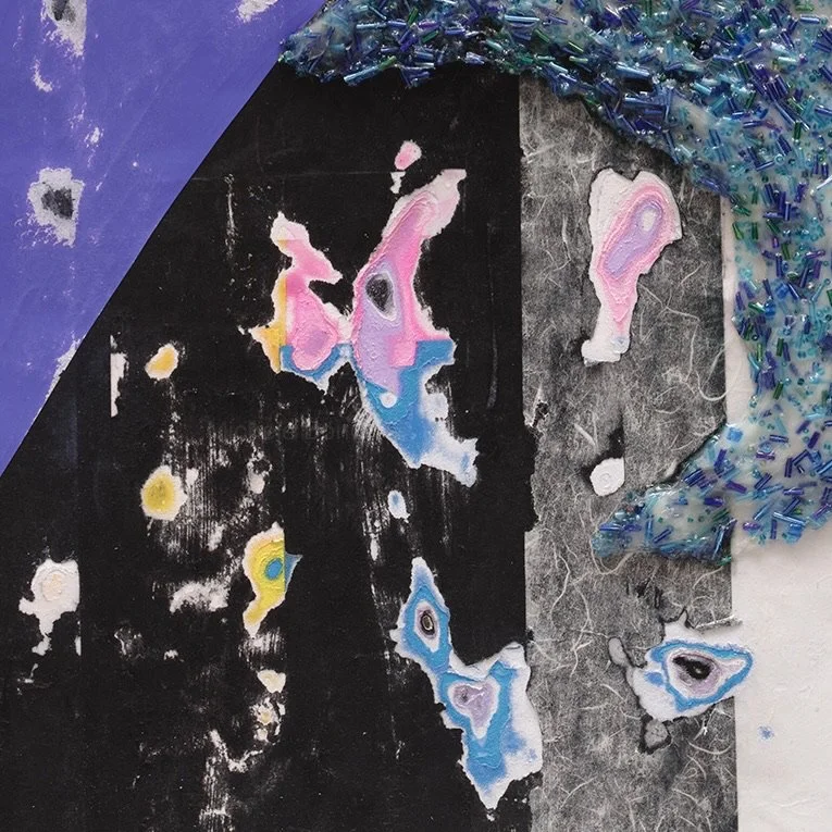 Detail of Metatron's Sketchbook showing layered and hand-carved paper surface