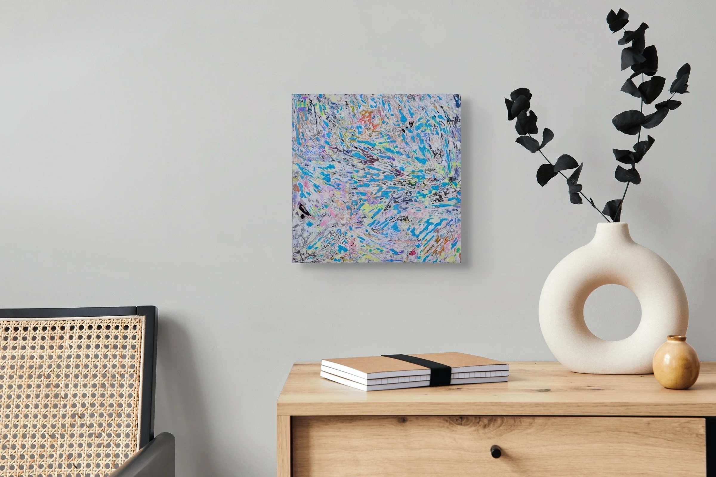 Fire #1, layered and hand-carved paper artwork by Michele Bonds, shown in contemporary interior
