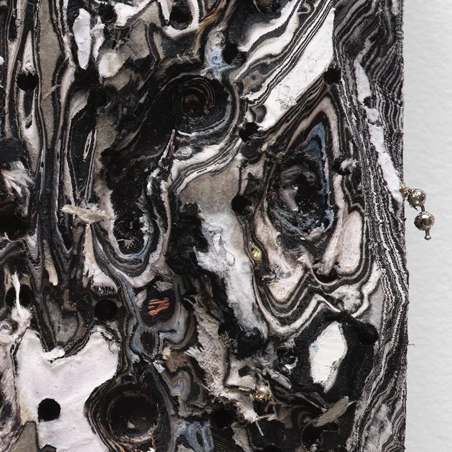 Surface detail of White #5 with exposed layers and sculptural cuts