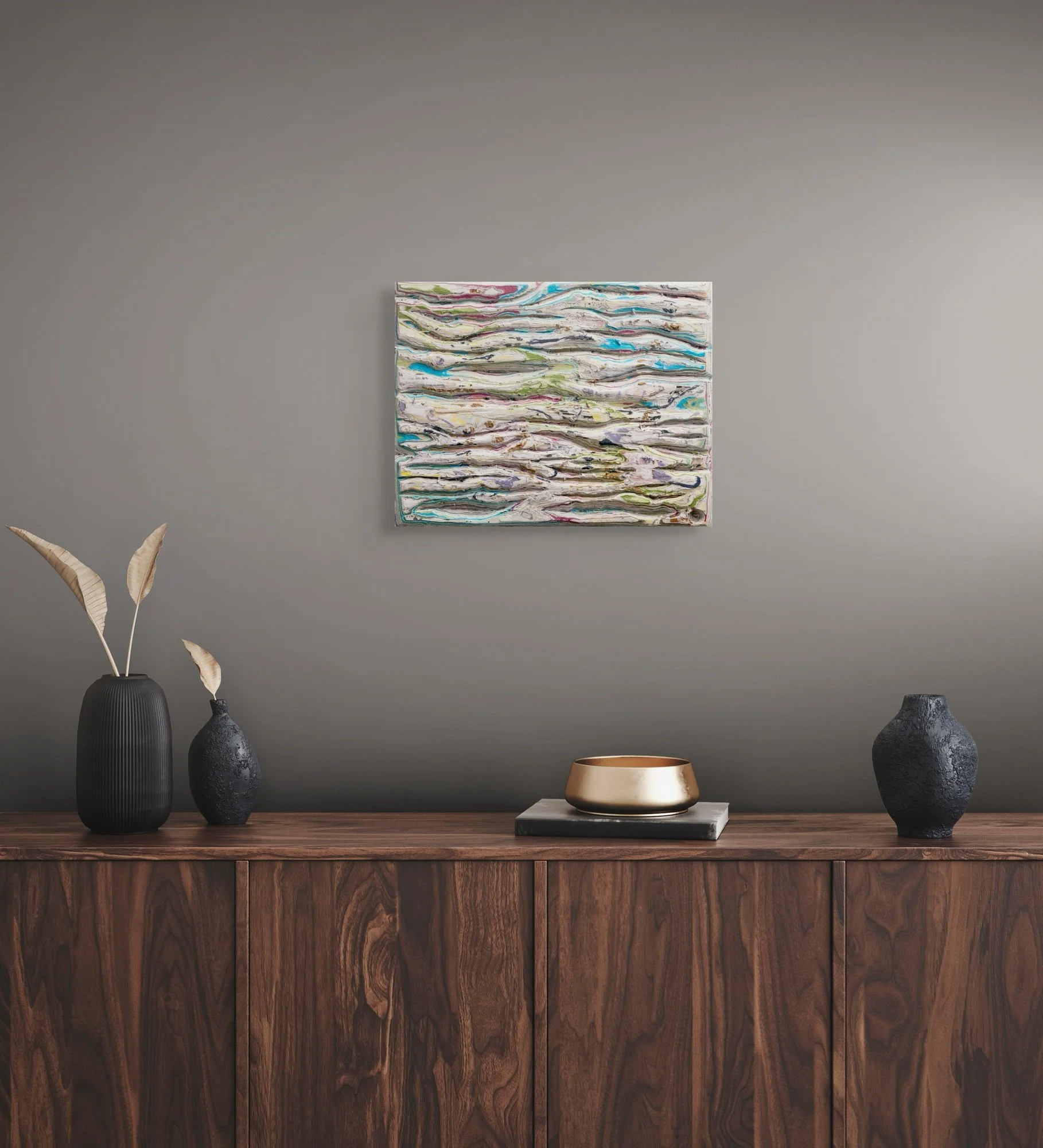 Accretion of Becoming, sculptural paper artwork by Michele Bonds, displayed in neutral interior setting
