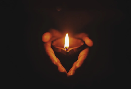 hands and candle.png