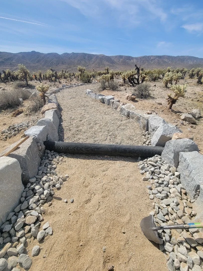 The trail crew at Joshua Tree has been working hard on building an accessible (ABA) trail through the Cholla Cactus Garden at Pinto Basin. The next major step is to tread the dry stone causeway with hard-packed natural material to facilitate access f