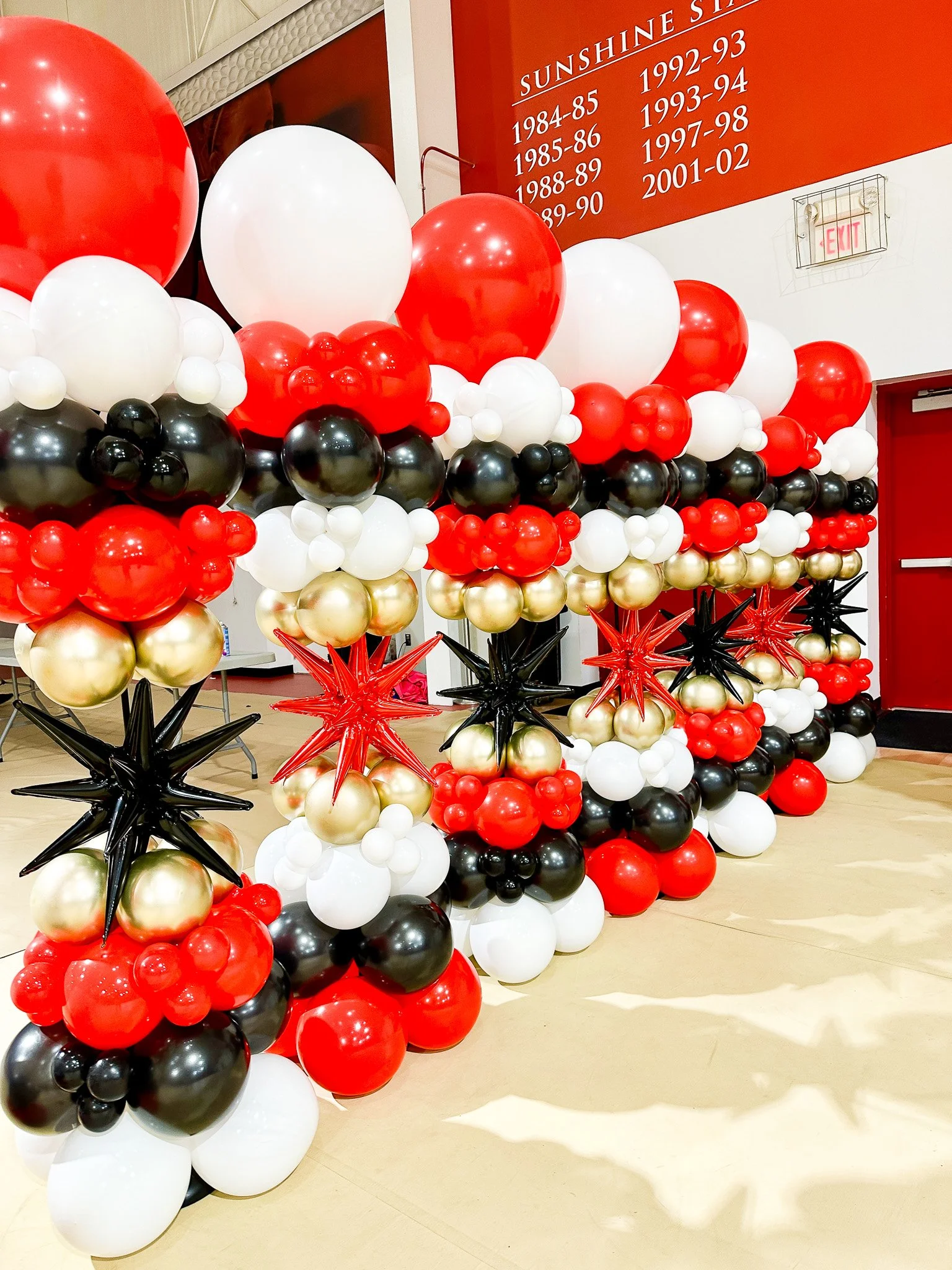 Balloon towers, columns, party poles  for school and college event. University of Tampa student admitted day.