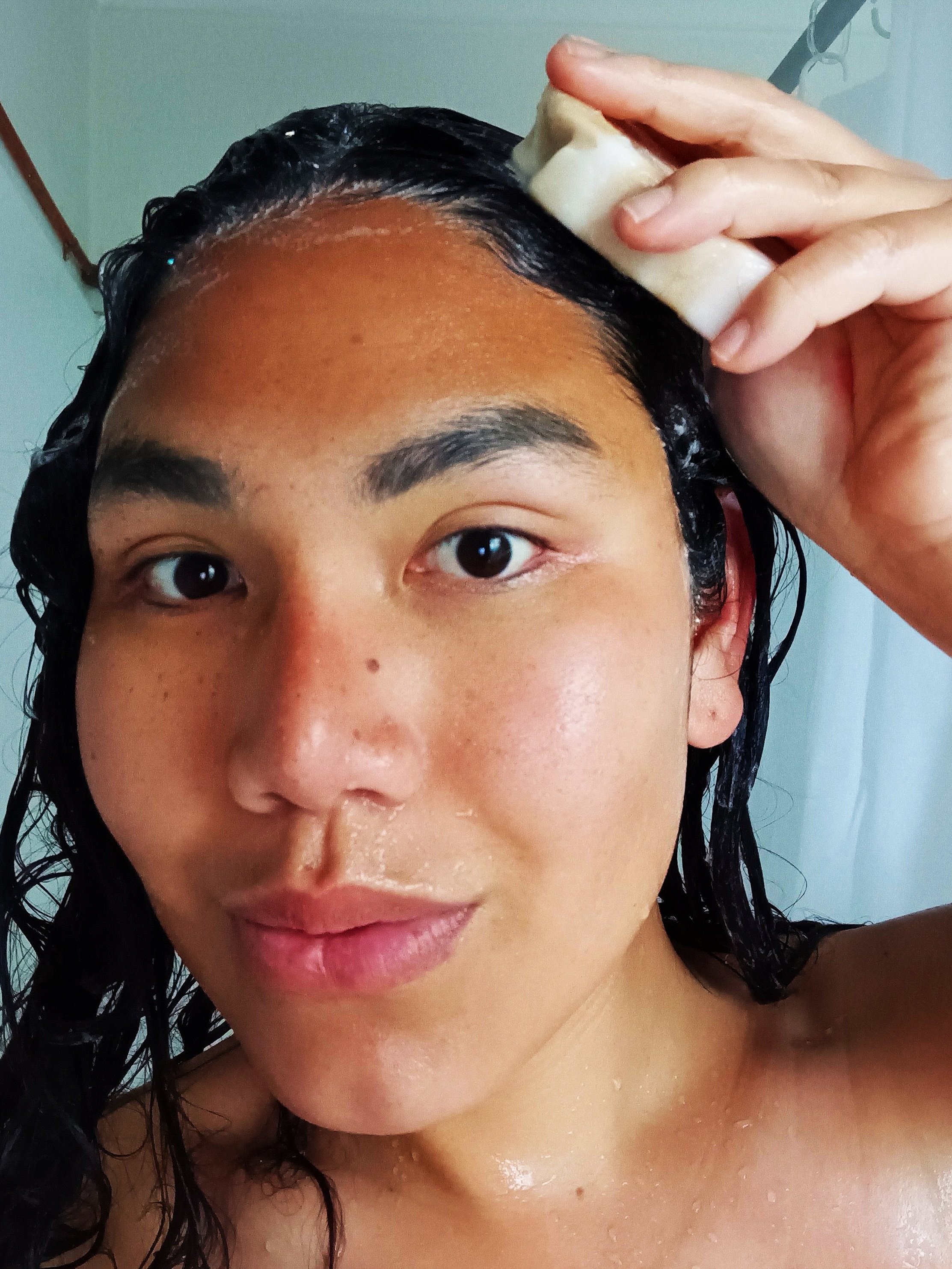 Rub ROBelle Farm hair soap all over your scalp.