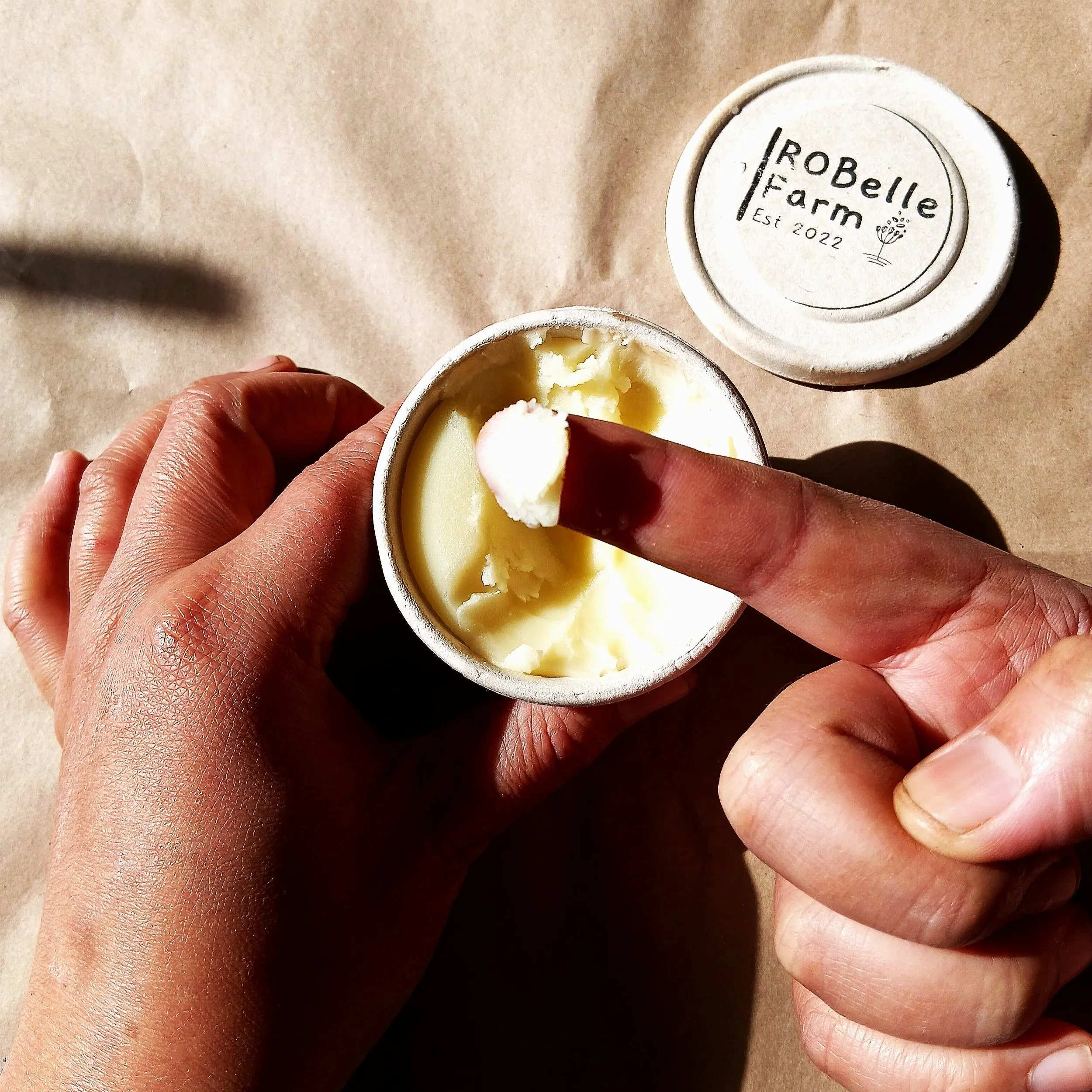 Open the tub, then press against the balm a little firmer for the first use.