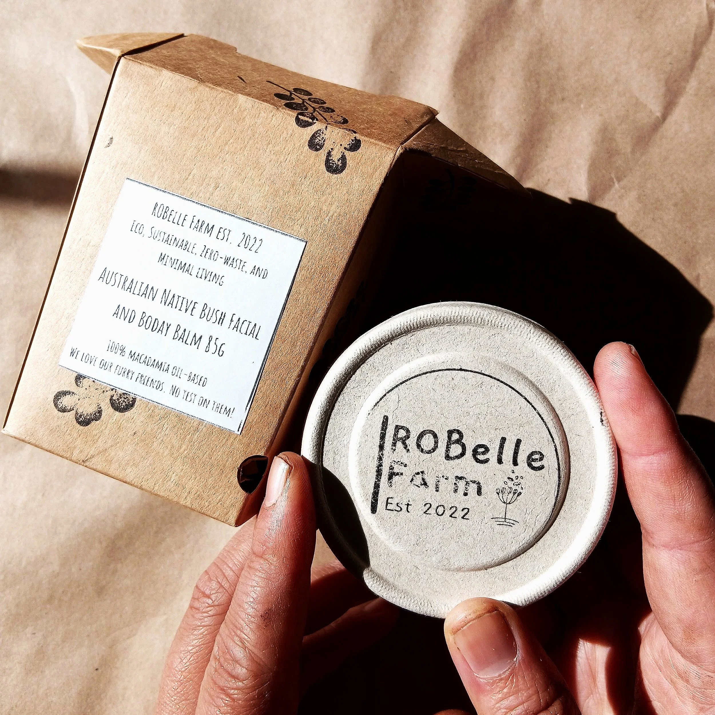 Once you open our paper box, there is the balm tub inside.