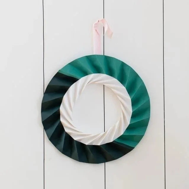  Origami Wreath. 
Make a beautiful reusable and sustainable card origami wreath, perfect for your front door.  £55pp. 
 
Format: Workshop,
Category: Creative Workshops,
Category: Christmas Decorations,
Theme: Christmas,
Minimum Spend: Under £1000,
Au