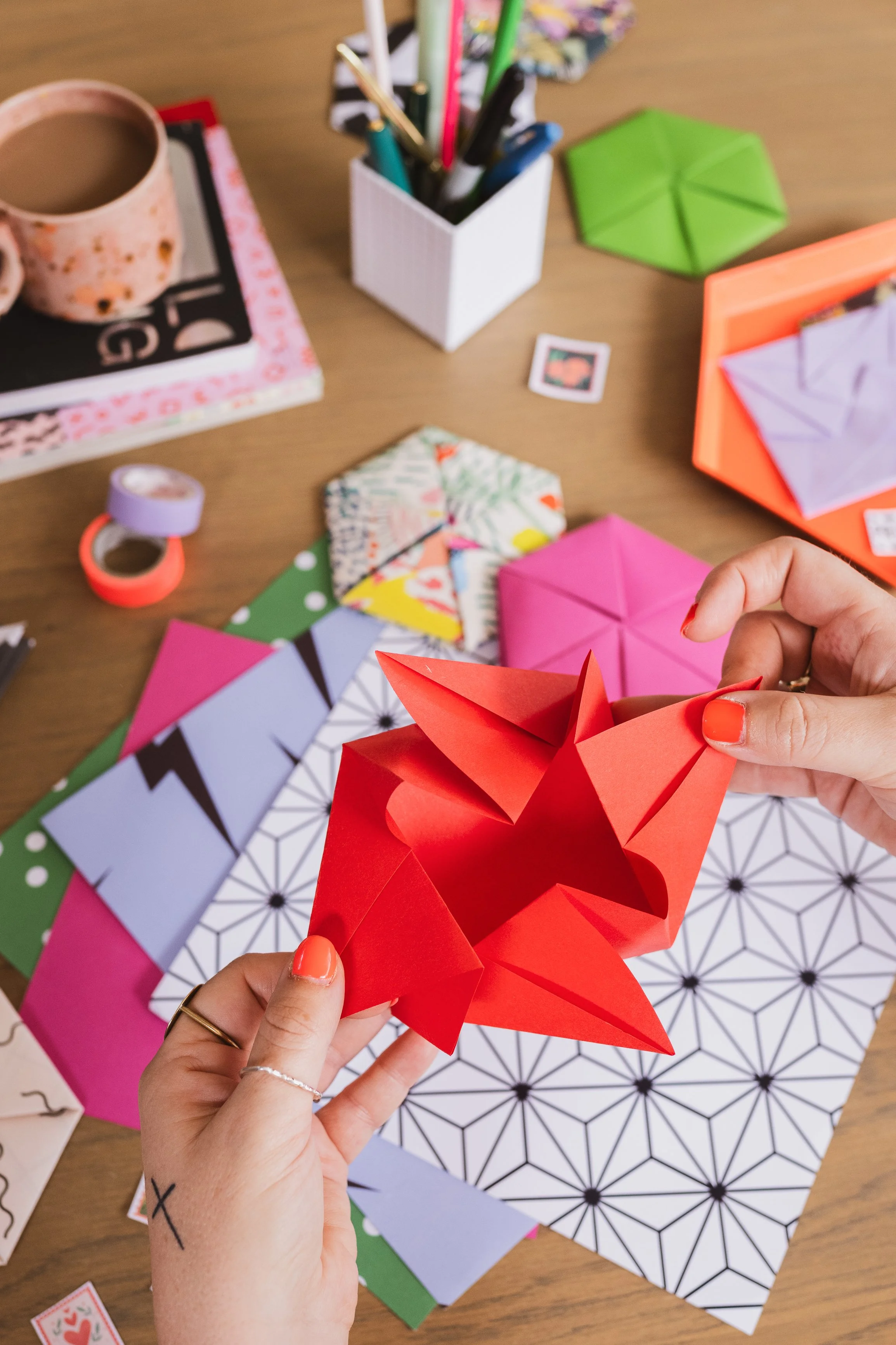  Origami Drop-in. 
A relaxed, informal setup where guests can drop in and learn beautiful origami techniques. 
 From £500. 
 
Audience: Everyone,
Activity: Hands on & Creative Activity,
 