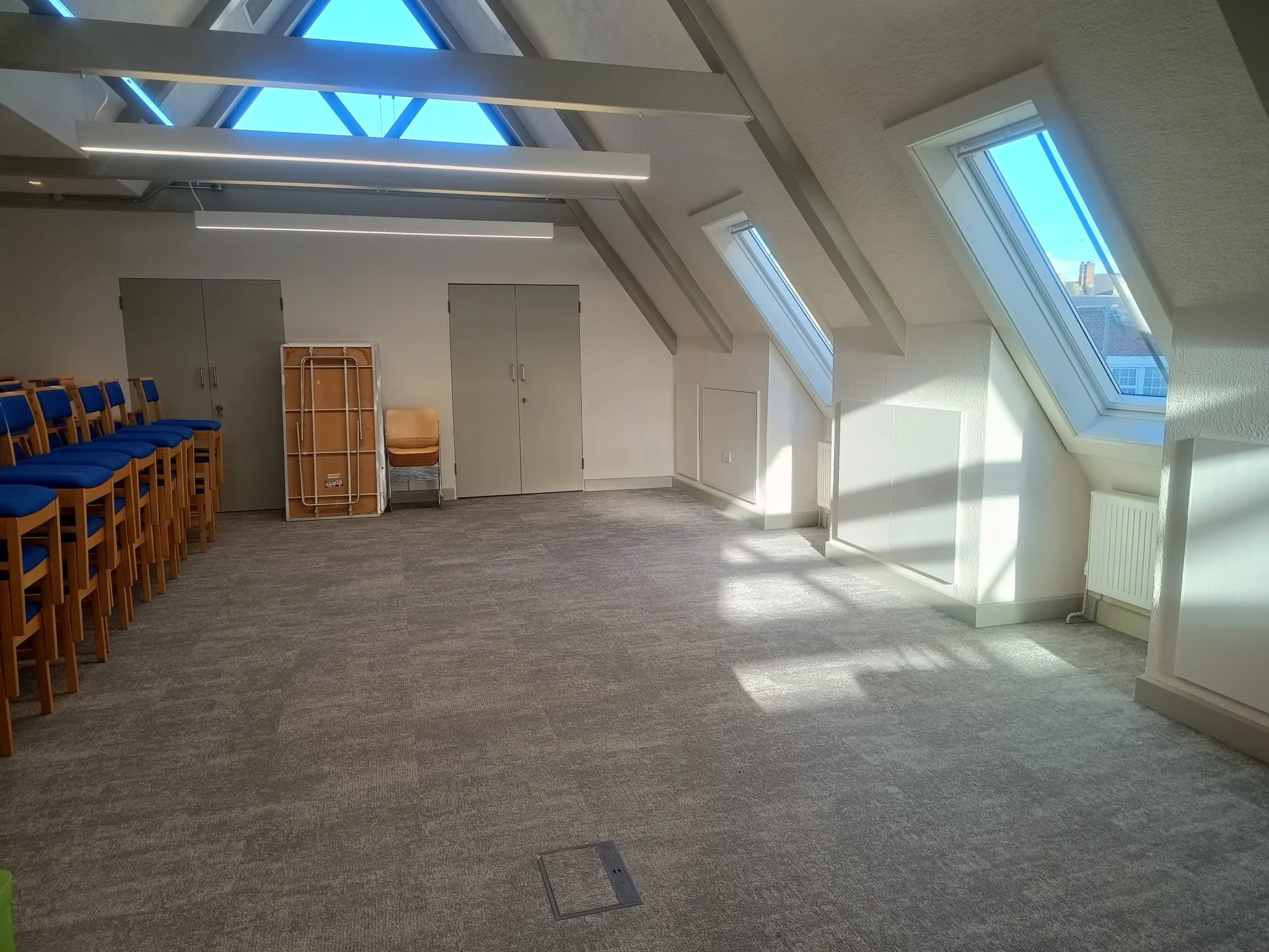 Skylight meeting room with new windows, fresh paint, carpet, raidators and electrical sockets
