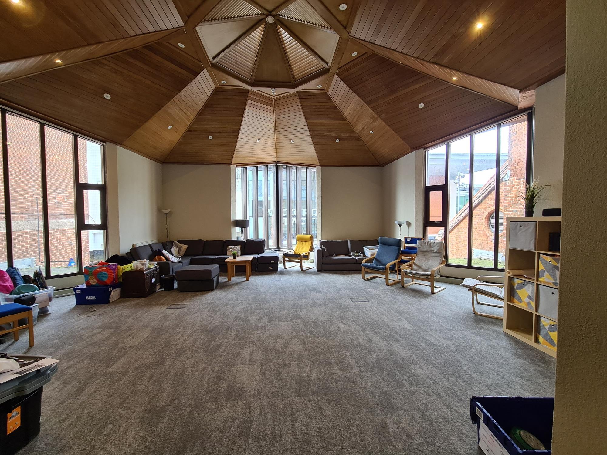 Octagon meeting room with an interim youth set up plus refreshed, paintwork, carpet, heating, ventilation and electrical sockets. 