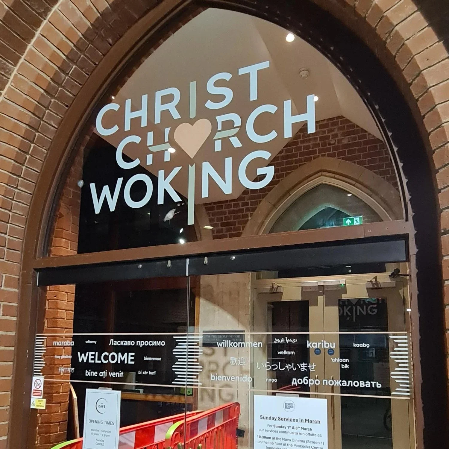 North Porch Door with new church logo and welcome message
