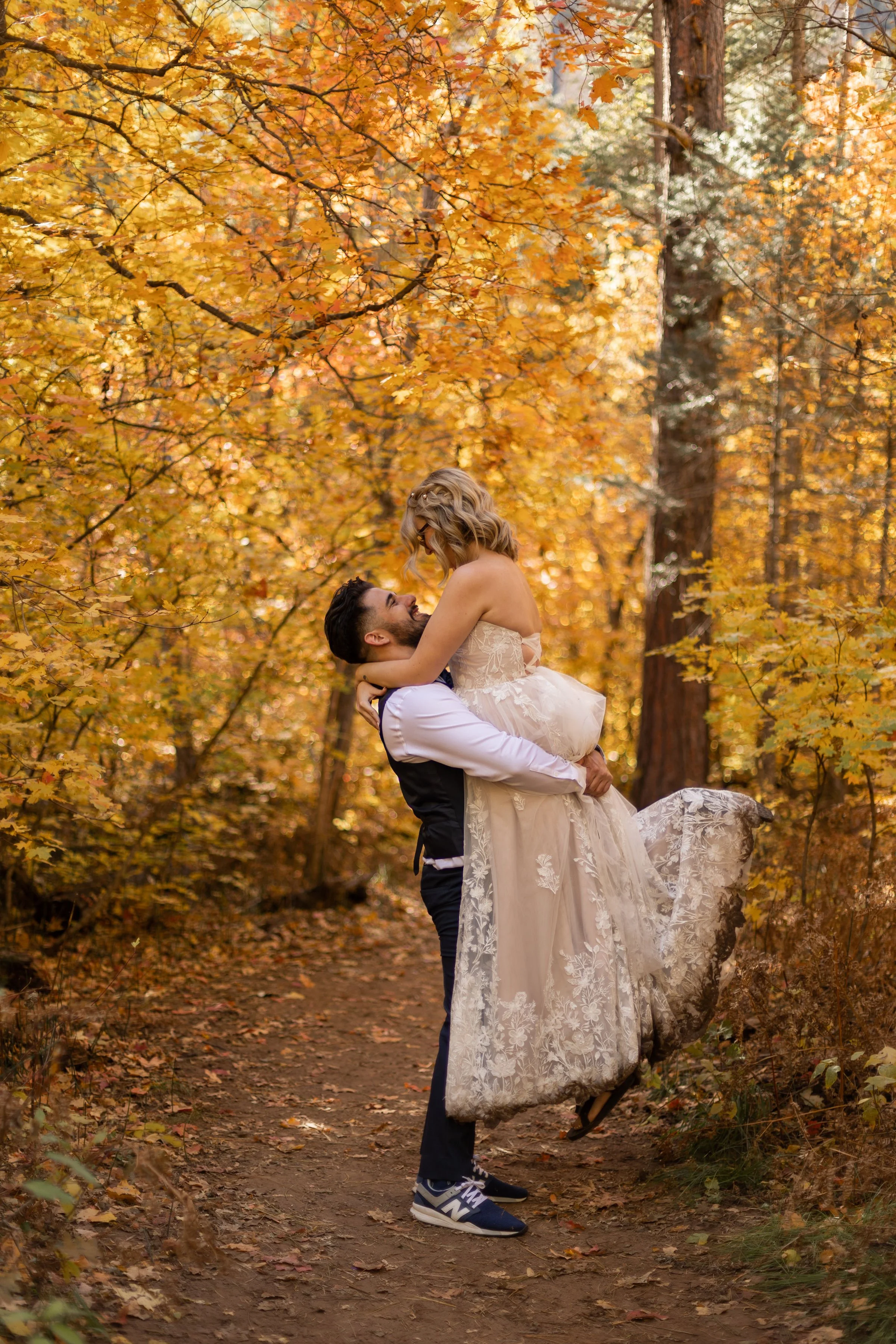 bride and groom hugging in west fork trail Sedona by Sedona elopement photographer Nick Patton