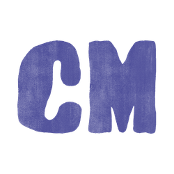 Close-up of the letters 'C' and 'M' painted in purple on a surface.