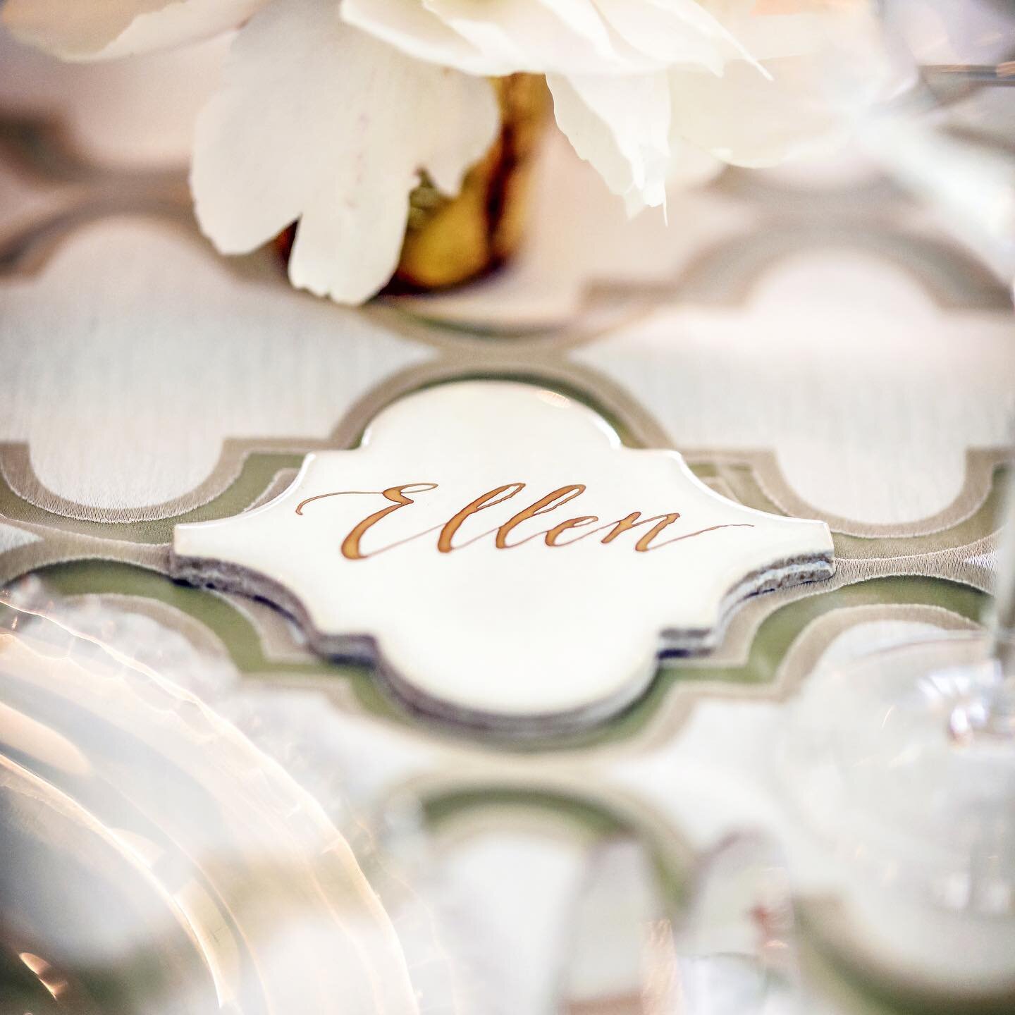 A perfect pair!  The design of this linen was the inspiration behind the arabesque porcelain tile placecards.  Each tile fit perfectly within the pattern of the linen and doubled as a custom takeaway for the guests! 💛 @echuchna @clairepsmith 
Photog