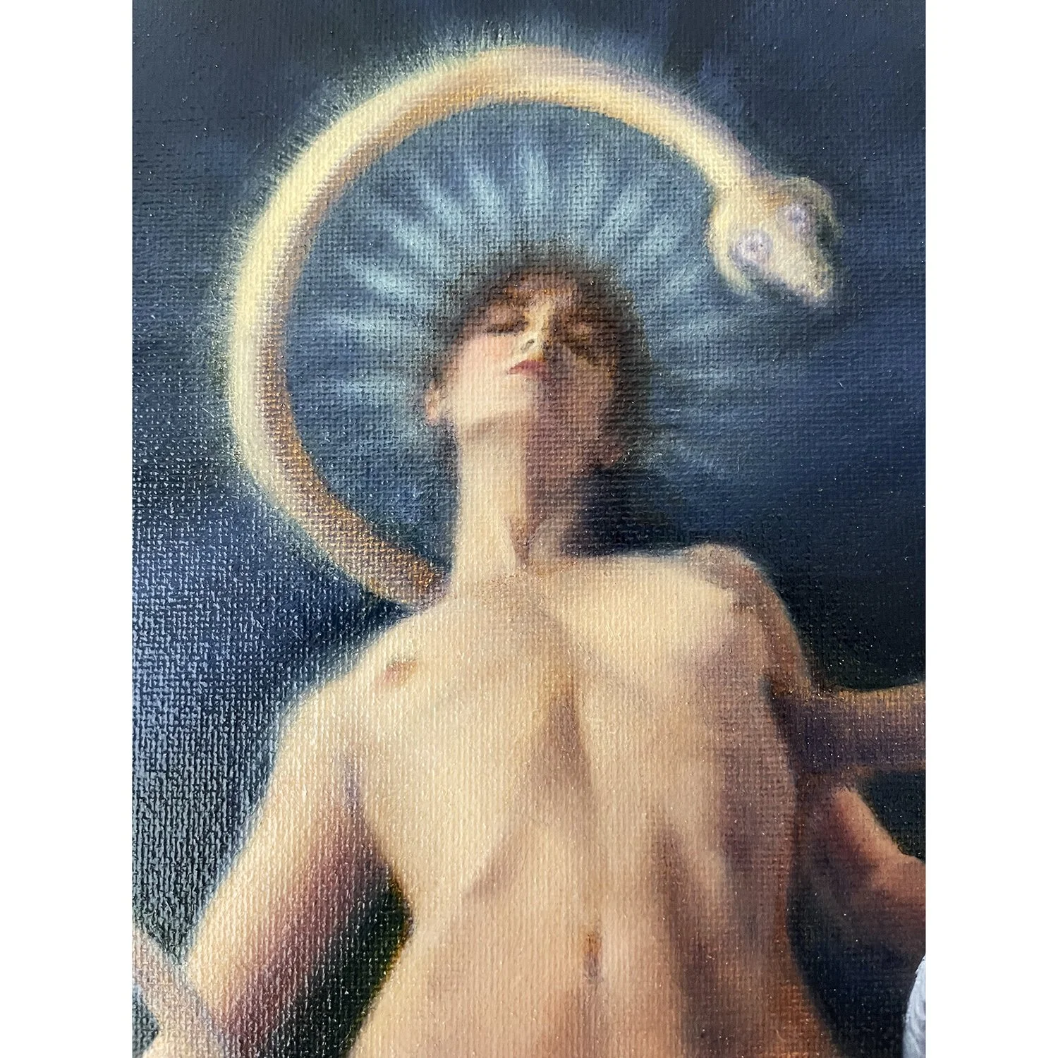 Detail of Resurrection, a goddess painting, showing her rayed halo and golden snake detail. By narrative artist Karina Tarin