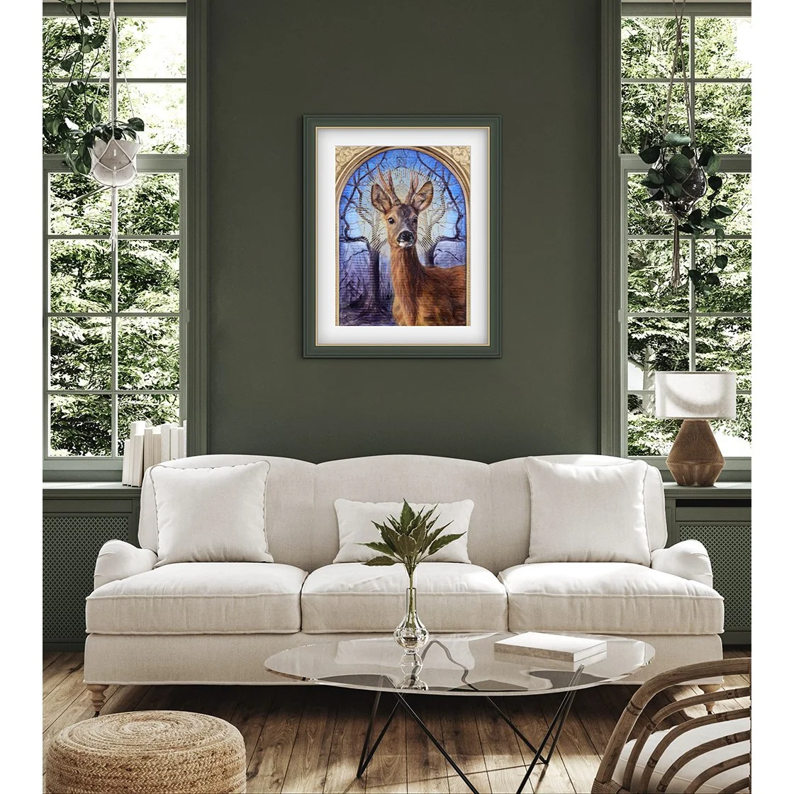 Framed giclee print is of a roe deer buck with a sunburst halo against a background of mirrored winter trees - hanging on a green wall in a sitting room. Print available to buy.