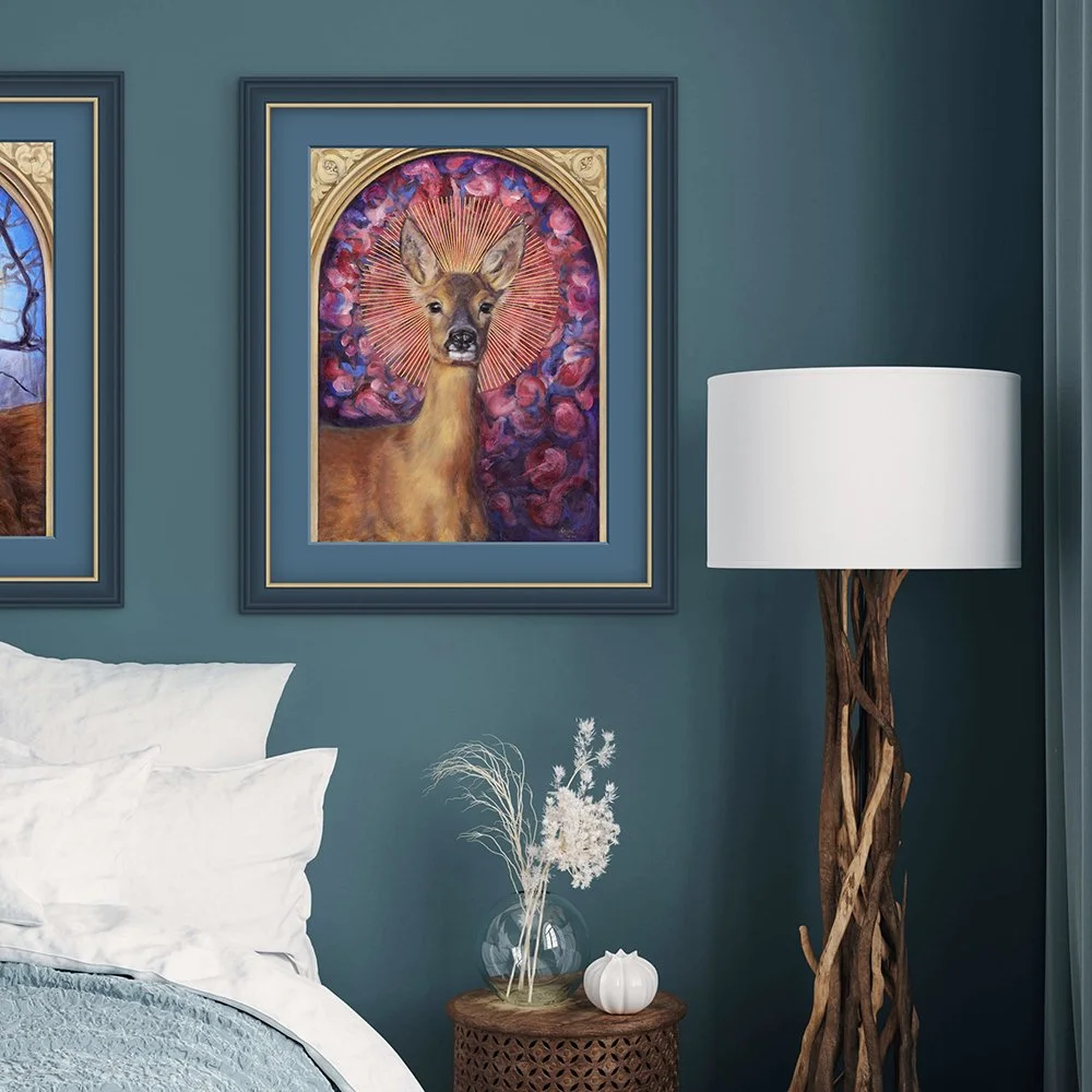Two beautiful giclee prints of deer in a bedroom. One shows a female roe deer, and the other is a male roe deer buck. Prints available to buy from Karina Tarin