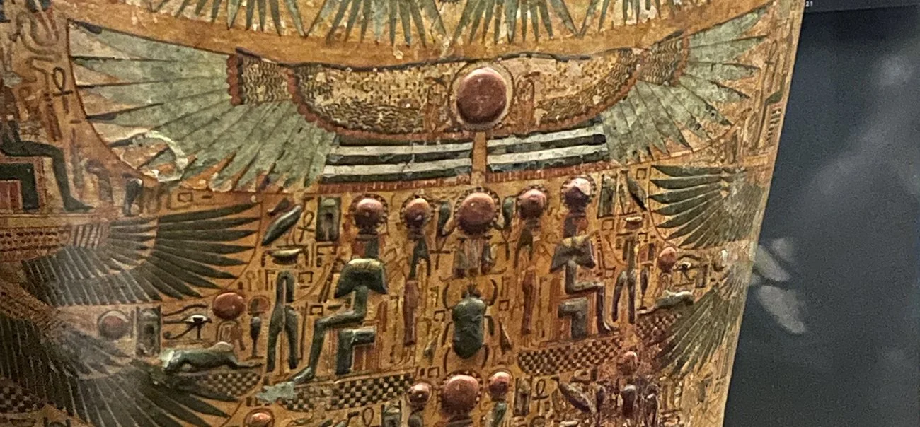 Winged sun disc representing divine power and protection on an Ancient Egyptian coffin