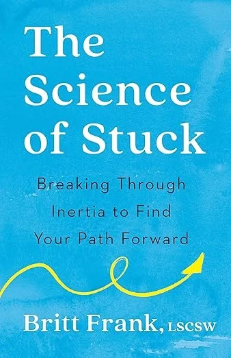 Book cover titled 'The Science of Stuck' with the subtitle 'Breaking Through Inertia to Find Your Path Forward' by Britt Frank, LCSW, on a blue background with a yellow arrow illustration.