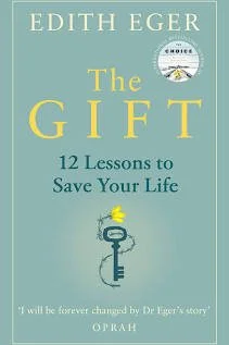 Book cover titled 'The Gift: 12 Lessons to Save Your Life' by Edith Eger with a light blue background, yellow and black text, and an illustration of a key with a yellow flower.
