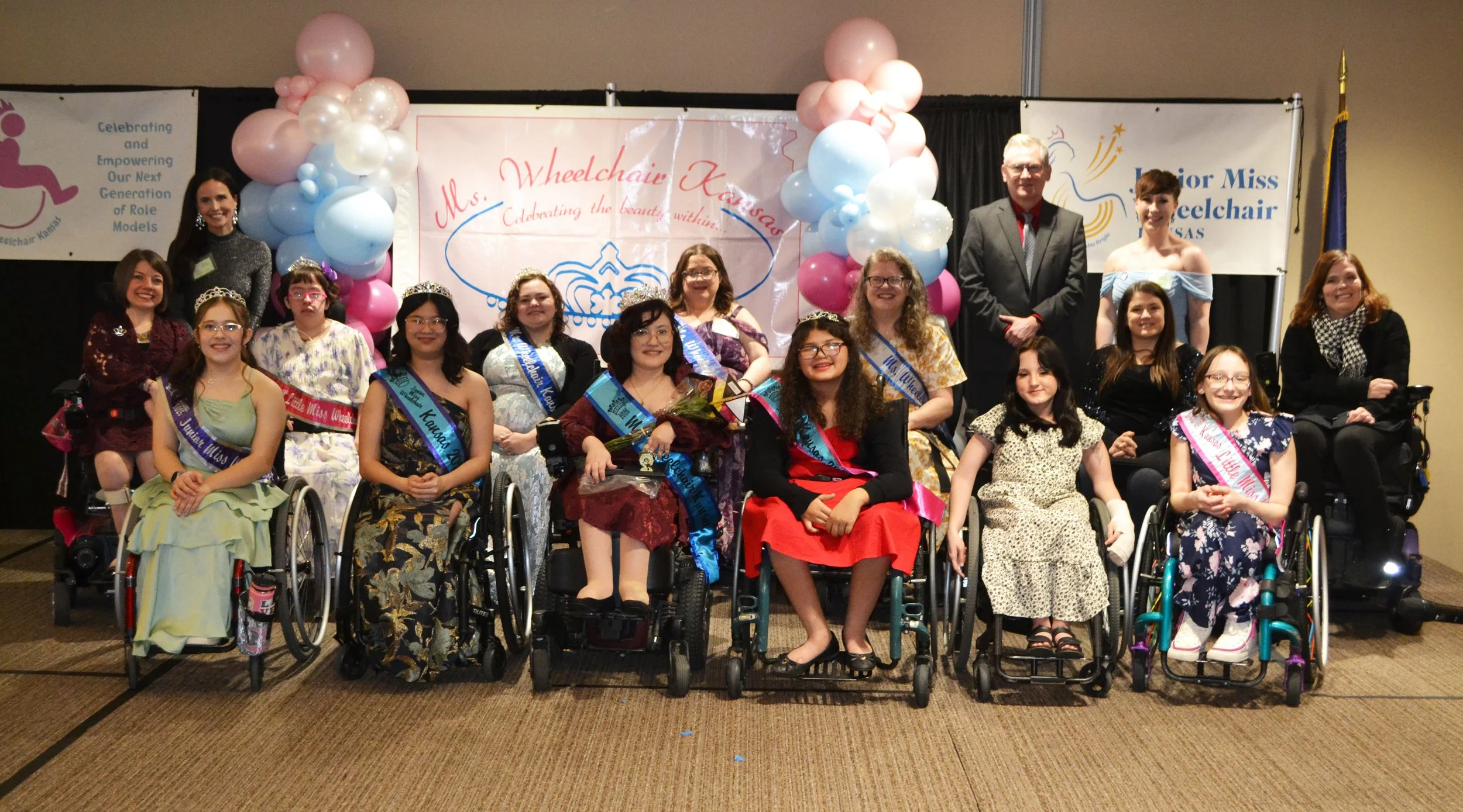 A large group photo of 2026 titleholders, former titleholders, and board members