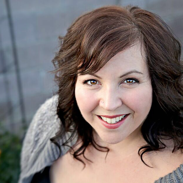 Celeste, a light-skinned woman smiling from an oval face with wavy brown hair
