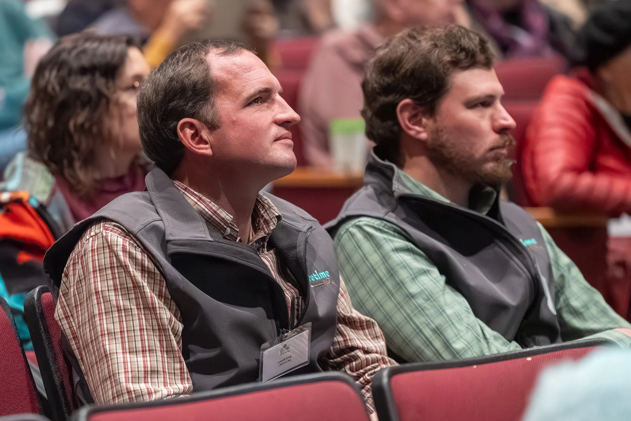 Guests listen to speakers