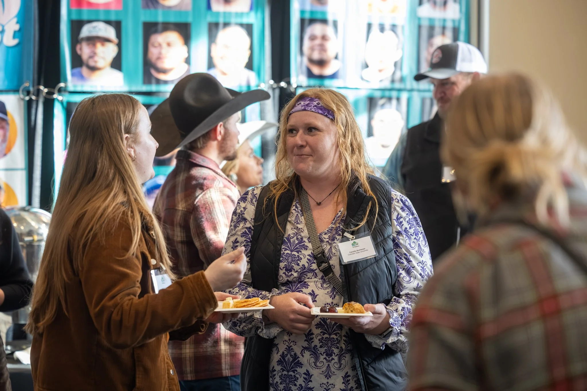 Guests enjoying snacks at the closing reception
