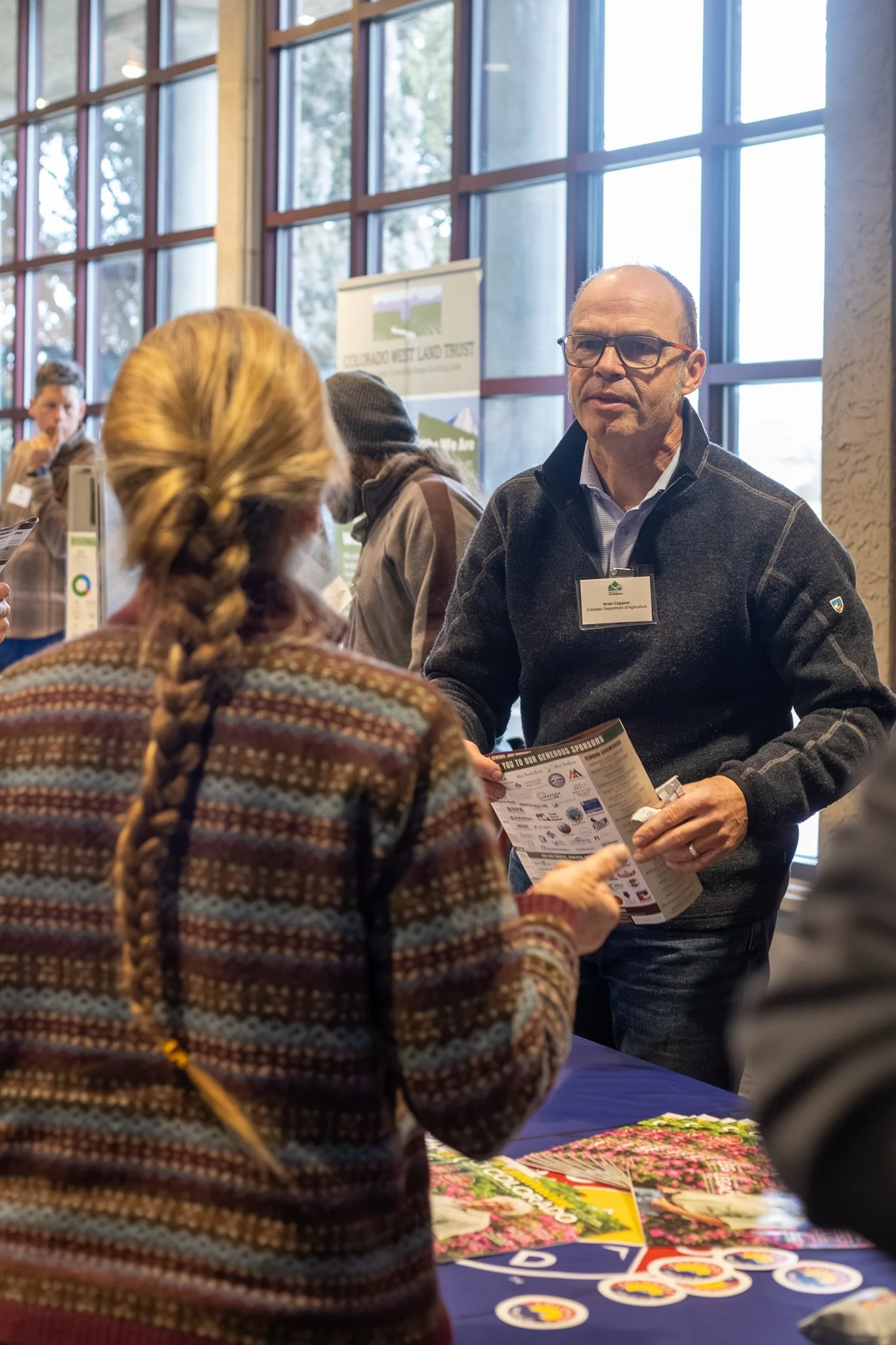 Guests interact with sponsors