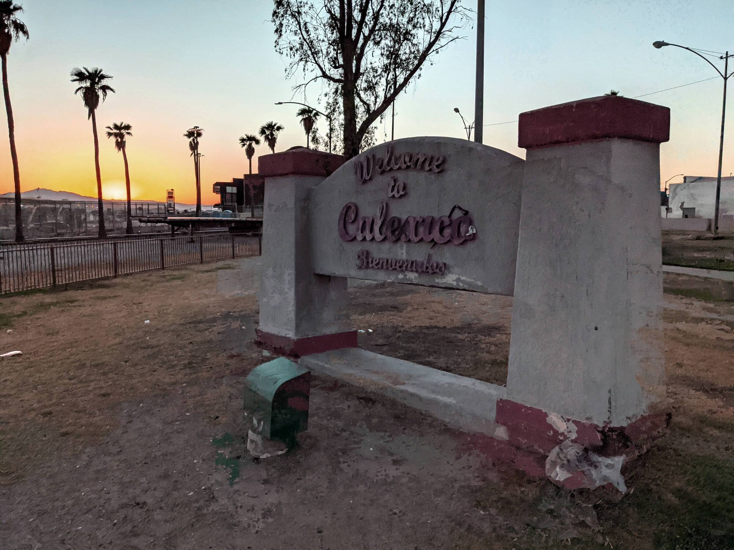 Calexico-Sign-Border-Fence-at-Sunset.jpg