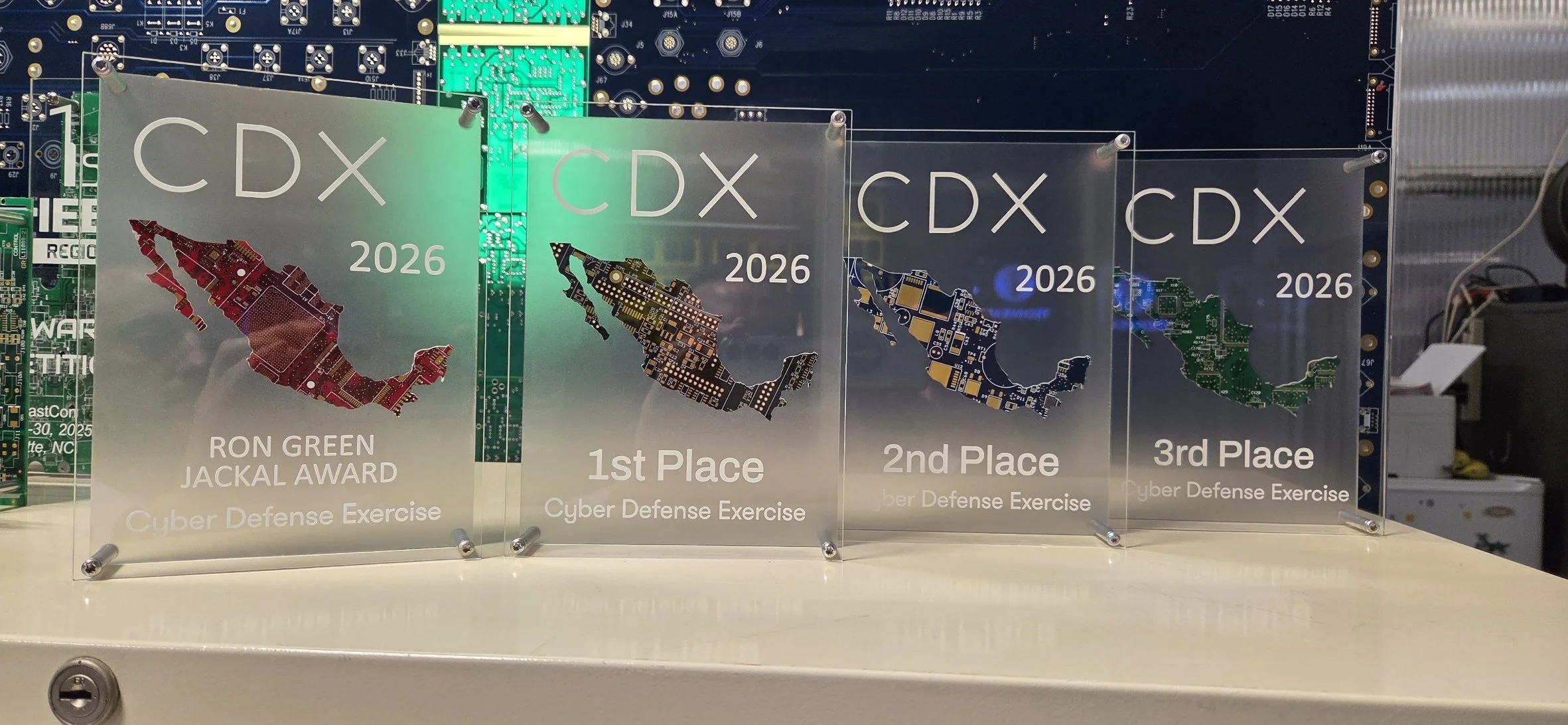 Four custom TechWears awards on display