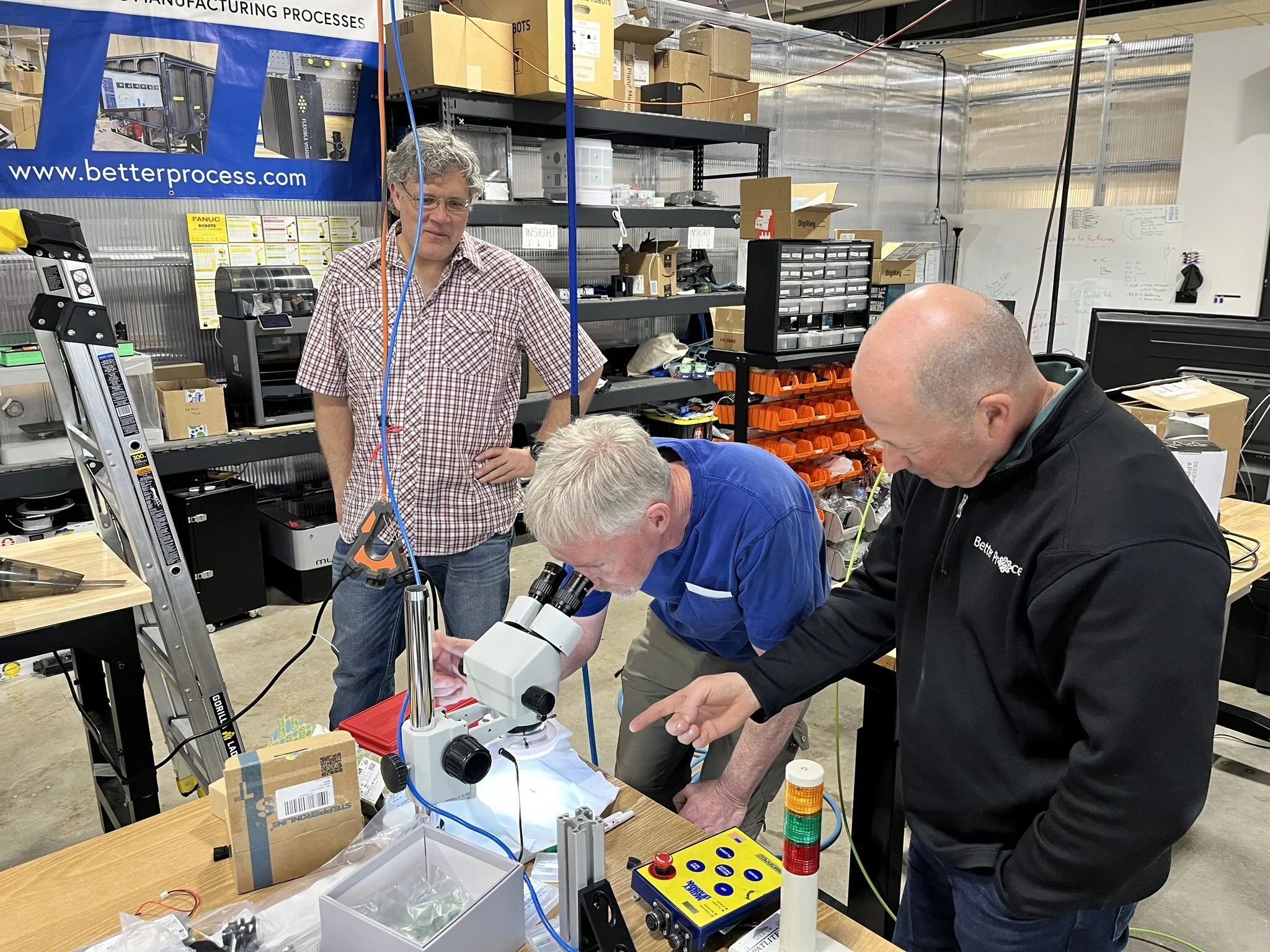 Three engineers collaborating