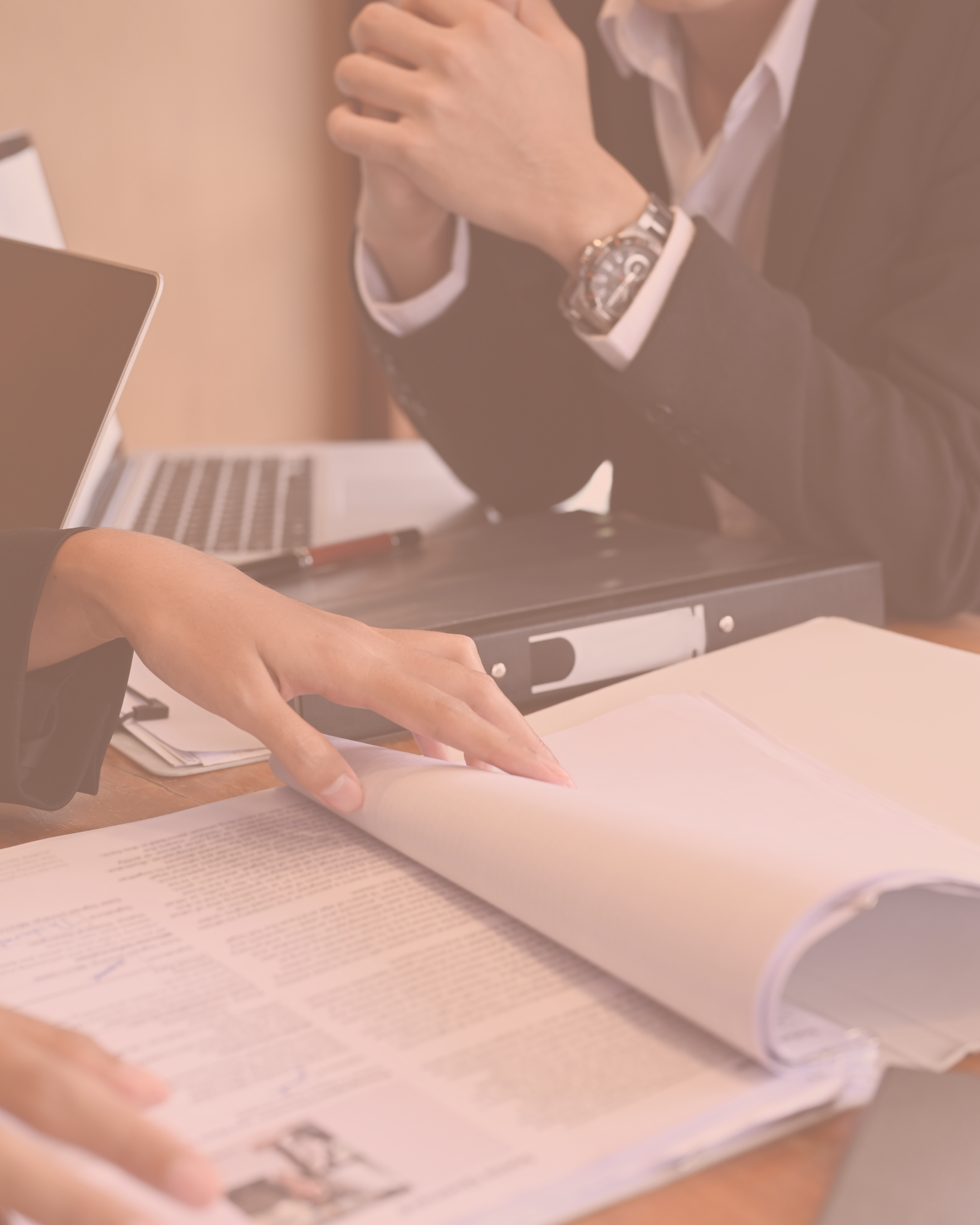 Two business people looking over documents