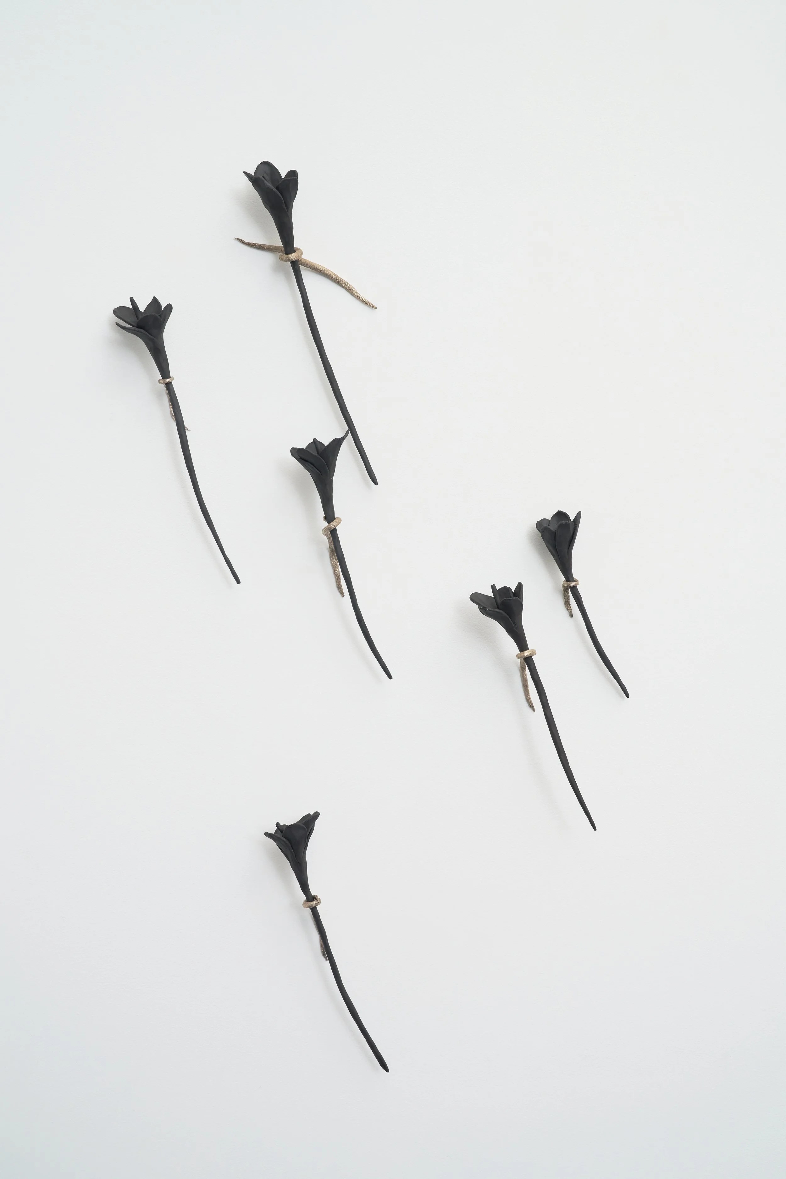 What Was Left of Me Bloomed, 2026, Ceramic and bronze, Various dimensions