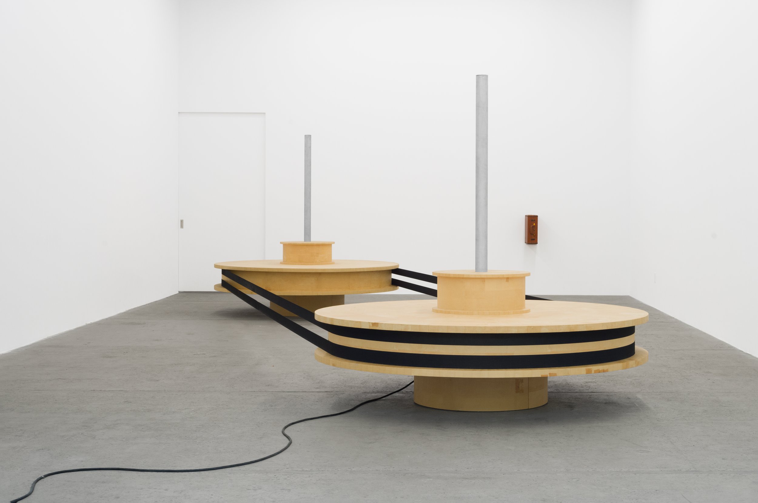 Hard drive, 2025, Pine, manilla paper, rabbit skin glue, nylon, motor, electronics, hardware, 80 x 74 x 330 in | 203 x 188 x 838 cm