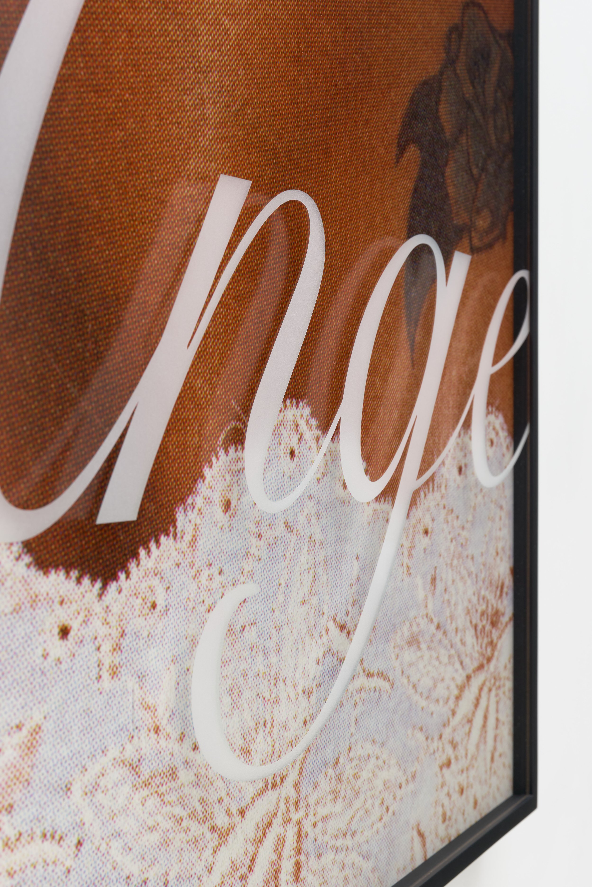Untitled (Angel I), 2025, Archival inkjet print, custom frame, sandblasted glass, vinyl, 38 x 28 inches + vinyl