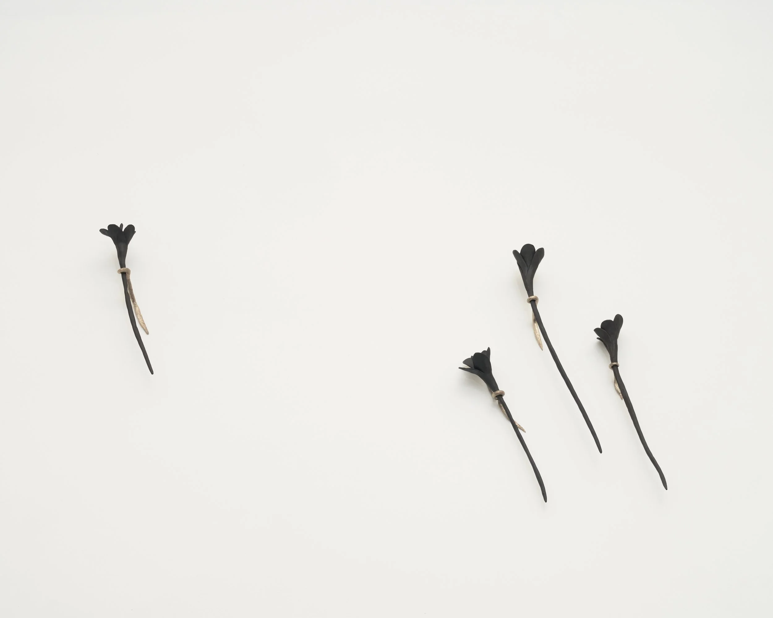 What Was Left of Me Bloomed, 2026, Ceramic and bronze, Various dimensions