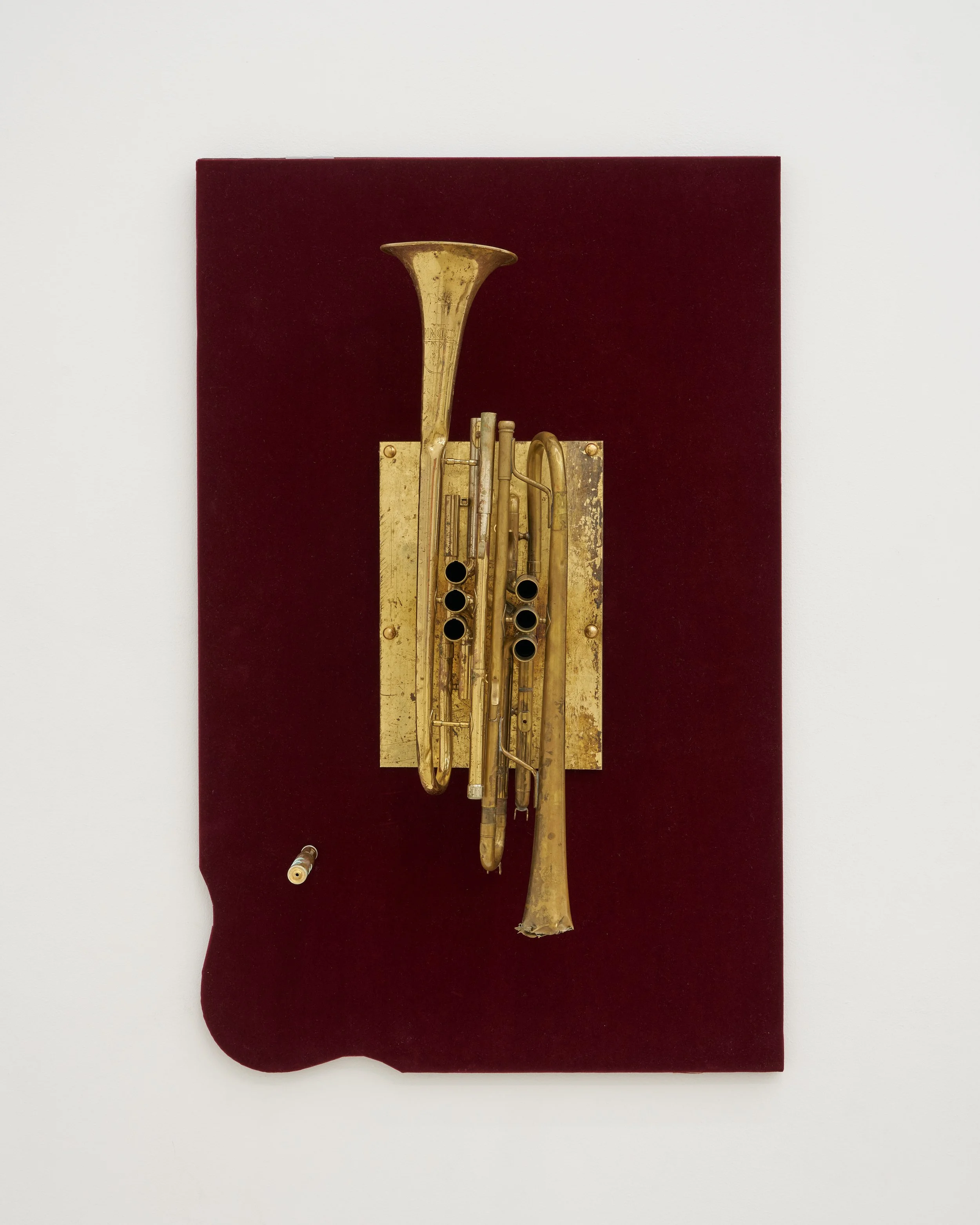 Gozié Ojini, Save Your Breath (Untitled), 2026. Altered brass instruments, velvet. 31 3/4 x 20 3/4 x 7 1/4 inches 