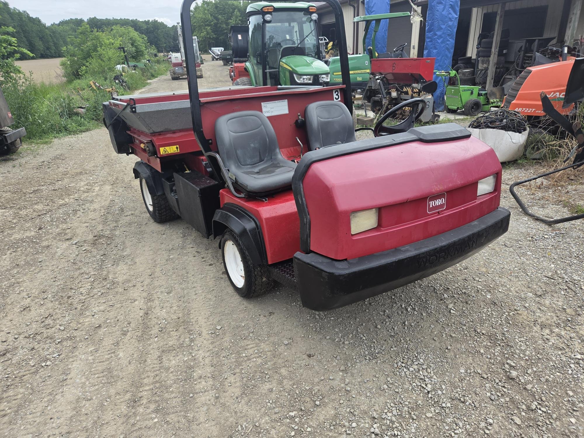 2013 Toro HDX gas watercooled unit with Toro topdresser and a bed