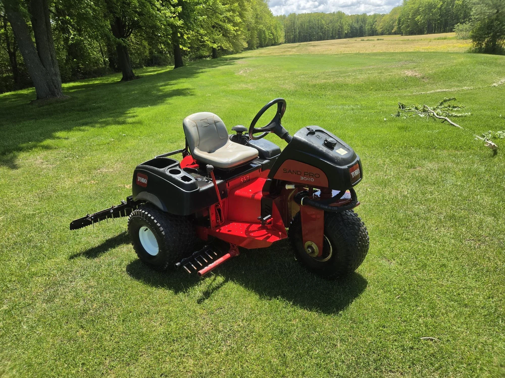 2014 Toro  sand pro with mid rakes and rear rake