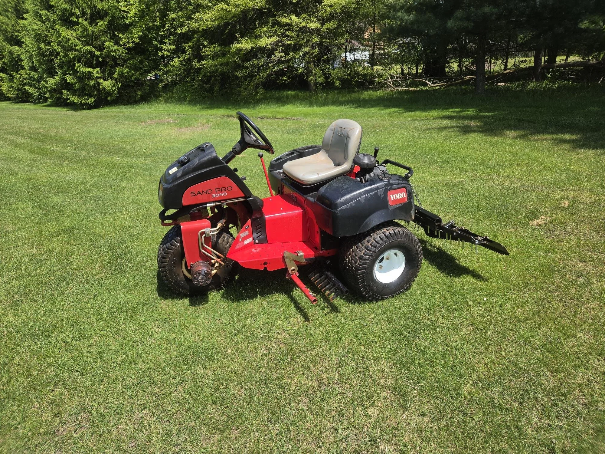 2014 Toro  sand pro with mid rakes and rear rake
