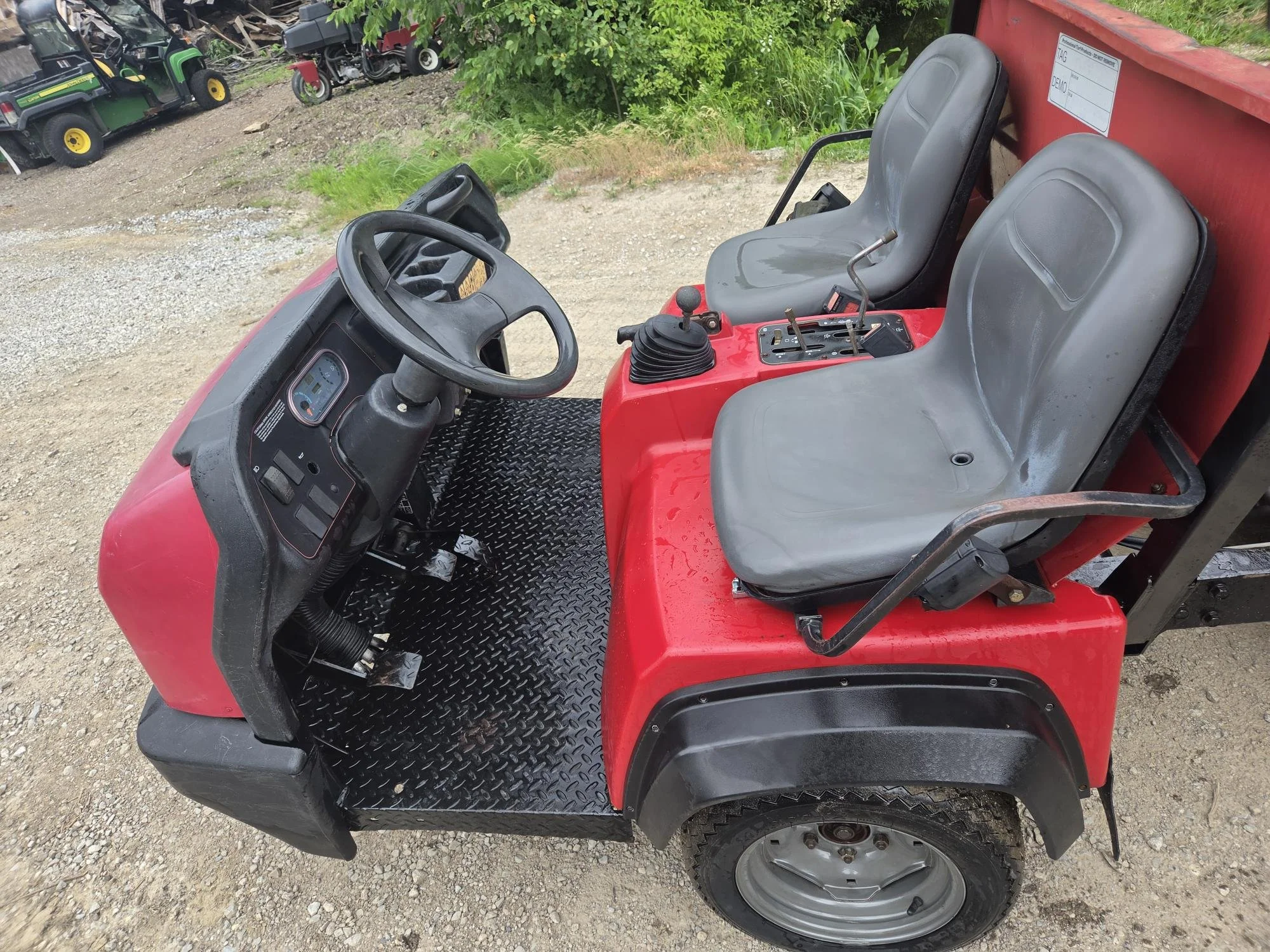 2013 Toro HDX gas watercooled unit with Toro topdresser and a bed