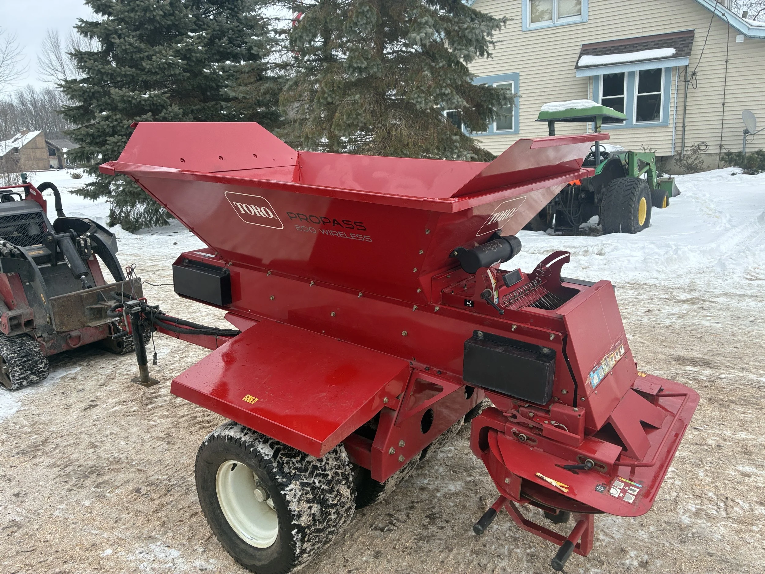 2011 Toro tow behind propass 200 topdresser