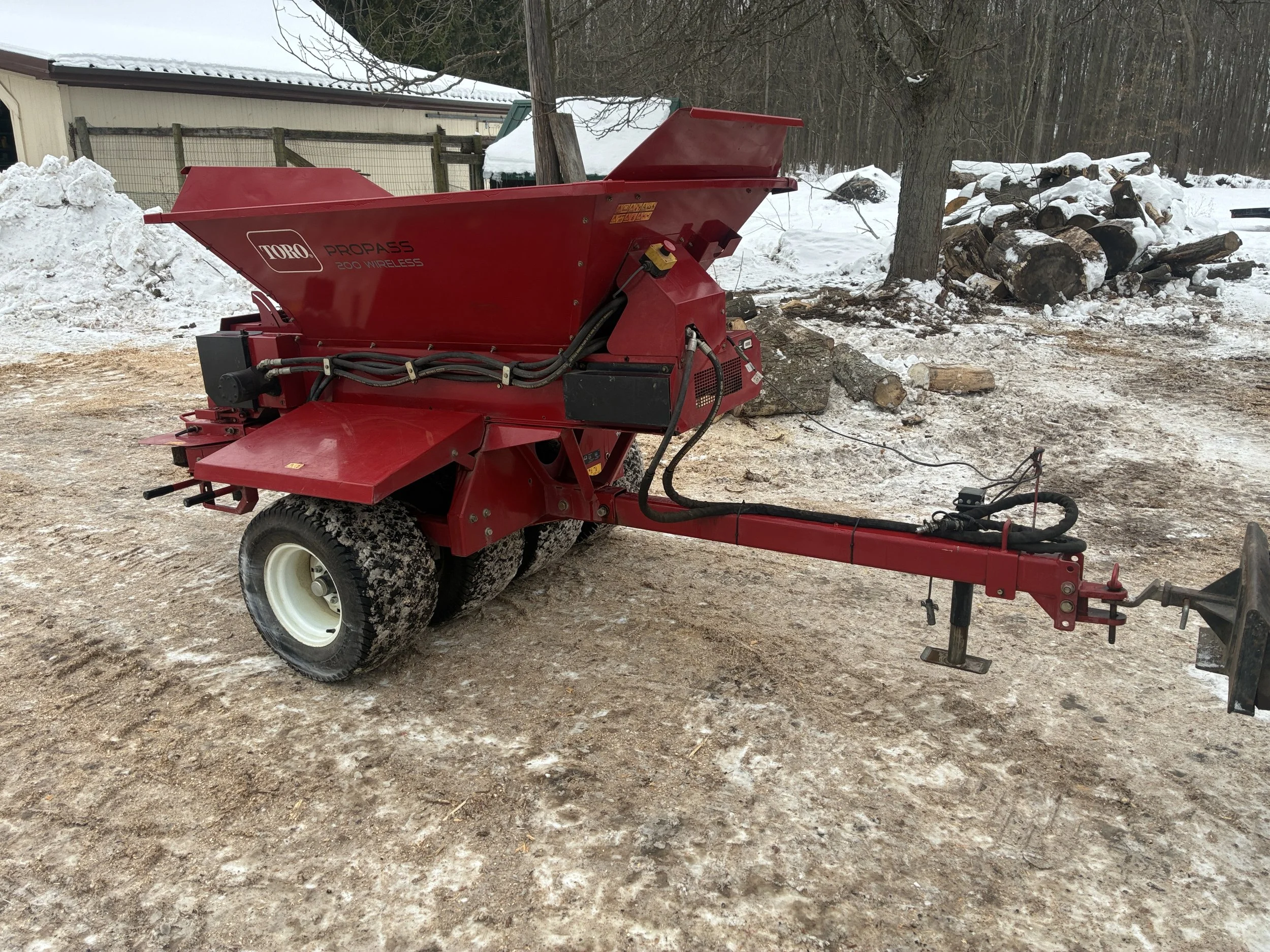 2011 Toro tow behind propass 200 topdresser